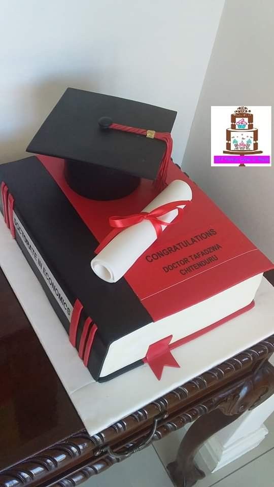 a graduation cake made to look like a book