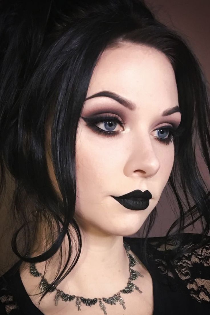 A young goth woman with dramatic gothic makeup look and hair is posing for the camera Maquillage Goth, Goth Makeup Looks, Goth Eye Makeup, Goth Outfit, Easter Makeup, Alt Makeup, Goth Glam, Black Lipstick, Alternative Makeup