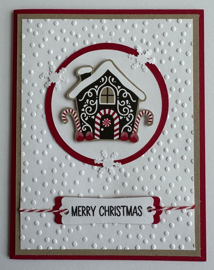 a christmas card with a house and candy canes in the center, on a white background