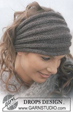 a woman wearing a knitted headband and smiling