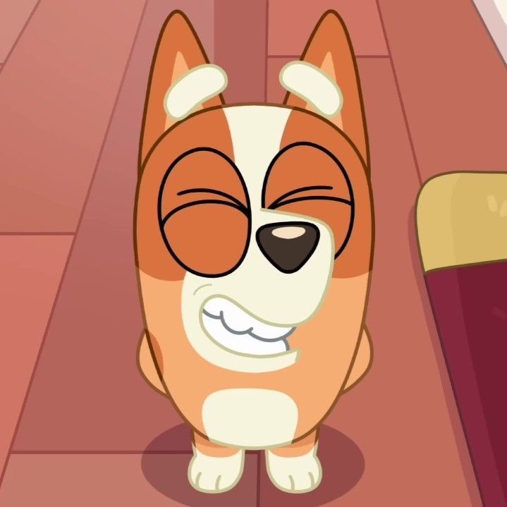 a cartoon dog with its eyes closed sitting on the floor