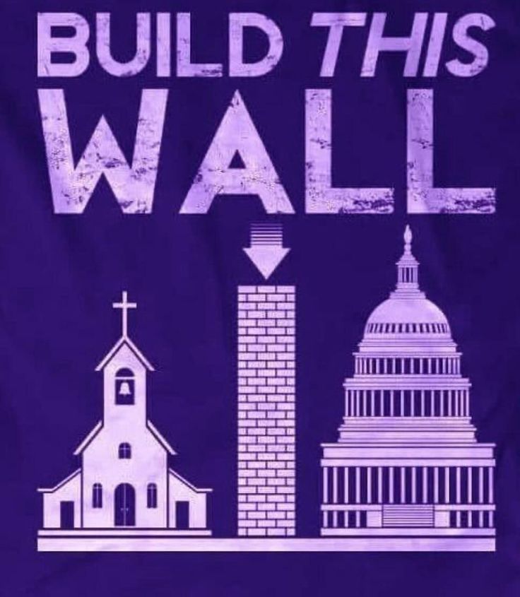 a purple t - shirt with the words build this wall in front of a church