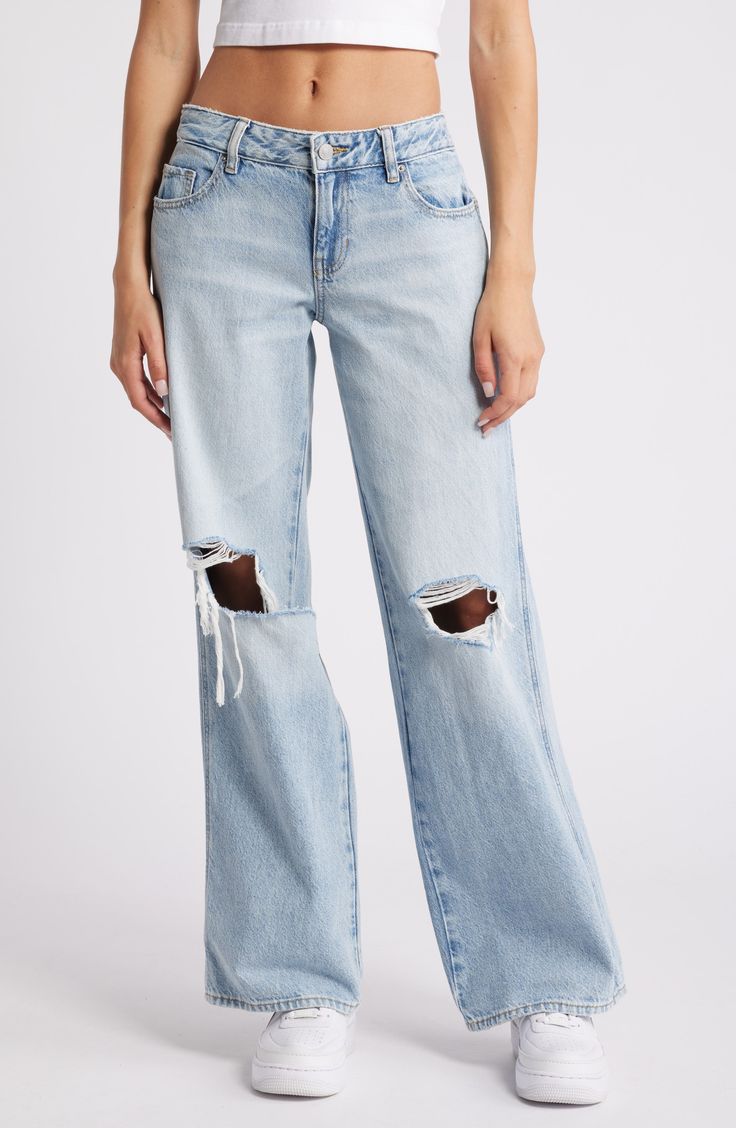 A baggy fit and slashed rips lend an edgier take on casual wide-leg jeans cut from nonstretch denim in a light wash. 32" inseam; 22" leg opening; 10" front rise; 14" back rise (size 29) Zip fly with button closure Five-pocket style 100% cotton Machine wash, line dry Imported Ripped Relaxed Fit Flare Jeans For Streetwear, Trendy Ripped Flare Jeans In Rigid Denim, Ripped Light Wash Flare Jeans For Streetwear, Edgy Ripped Relaxed Fit Jeans, Casual Wide Leg Ripped Pants, Ripped Mid-rise Flare Jeans In Rigid Denim, Casual Distressed Flare Jeans In Rigid Denim, Ripped Cutoff Flare Jeans For Spring, Ripped Light Wash Full Length Flare Jeans