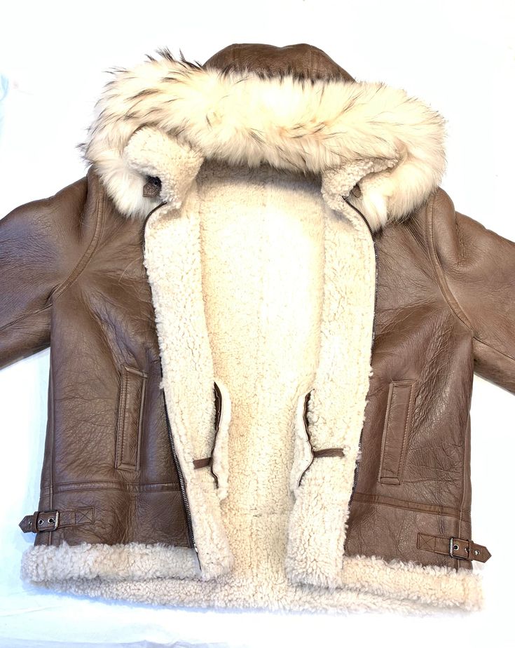 Kashani Men's Chocolate Brown Shearling Fox Hooded Bomber JacketMaterial: Shearling and FoxStyle: BomberColor: Chocolate Brown Hooded Sheepskin Outerwear With Fleece Lining, Hooded Fur Coat With Faux Fur Lining, Hooded Shearling Fur Coat With Faux Fur Lining, Winter Aviator Shearling Fur Coat, Luxury Aviator Winter Outerwear, Brown Hooded Leather Jacket With Faux Fur Lining, Brown Aviator Fur Coat With Faux Fur Lining, Shearling Aviator Fur Coat With Faux Fur Lining, Aviator Shearling Fur Coat With Faux Fur Lining