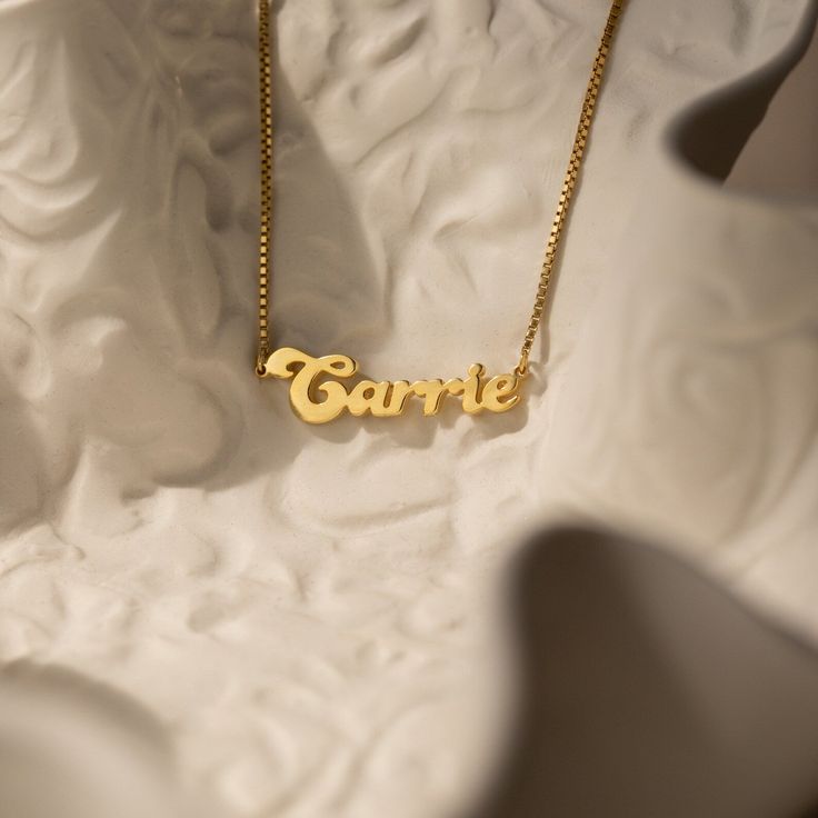 Our Name Necklace in our newest groovy bubble font is the ultimate custom gift for someone who is just as fun loving as this design. Personalize this nameplate necklace with anything you want from a name to your life mantra and gift yourself a unique jewelry piece you will never want to take off. Material: High Quality Solid 925 Sterling Silver Finish: Sterling Silver ∙ 18K Gold ∙ Rose Gold Dimensions: Depending on your font choice, height sizes range from 3mm to 4mm lowercase Size: The total ne