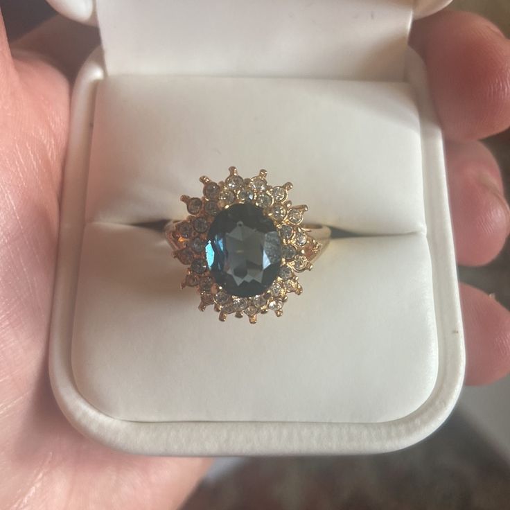 Gorgeous 14k Gold And Blue Sapphire Center Stone. Diamonds On The Outside. Never Worn, In Original White Leather Ring Box With Ravello Signage And White Box. Would Make Excellent Gift As New And All Intact Casings. Got This From My Mom. Looks Very Exquisite And Expensive, Quality. Added Pics Form Website To See The Brand/Qualities. Please Look Up Ravello Beverly Hills For Info On The Brand. Sapphire Cluster Ring For Formal Occasions, Marquise Cut Gold Jewelry For Proposal, Formal Sapphire Cluster Ring With High Clarity, Luxury 14k Gold Cluster Ring With Accent Stones, Luxury Cluster Ring With Accent Stones In 14k Gold, 14k Gold Baguette Cut Jewelry For Proposal, Classic Gold Sapphire Ring For Proposal, Formal Fine Jewelry Topaz Princess Cut Ring, Yellow Gold Sapphire Topaz Ring With Halo Setting