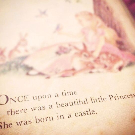 an open book with the words once upon a time there was a beautiful little princess she was born in a castle