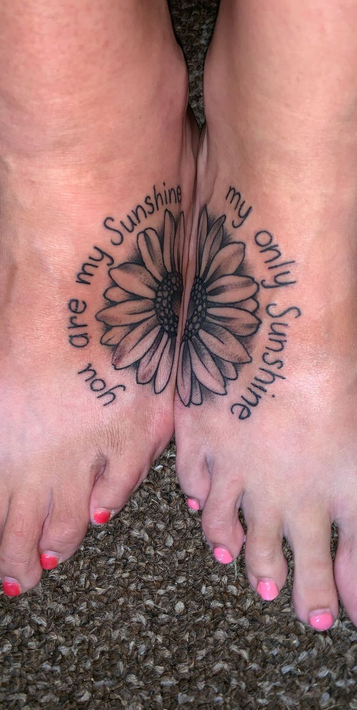 two feet with tattoos on them that say i love you sunshine and my sunflower