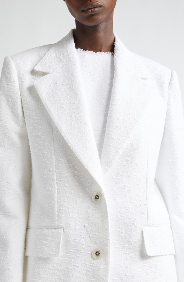 Part of D&G's Capri collection celebrating summers in '60s Italy, this optic-white single-breasted blazer is tailored from richly textured cotton-forward tweed. Front button closure Notched lapels Four-button cuffs Chest welt pocket; front flap pockets Silk lining 80% cotton, 15% linen, 5% nylon Dry clean Made in Italy Designer Clothing Luxury White Blazer With Structured Boning, White Luxury Blazer With Structured Boning, White Structured Blazer With Button Closure, Modern White Blazer, Fitted White Tweed Blazer, White Blazer With Structured Boning For Office, Luxury White Office Blazer, White Tailored Tweed Blazer, Designer White Spring Blazer