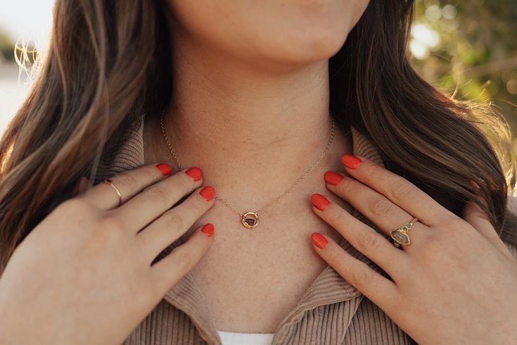 January Moment Necklace • Garnet What it represents: The little circle on this design reminds me of a clock, or time; and the stone represents a moment, a moment in time. We have these designs with every month’s stone, so you can use them to represent any moments that are special to you. Certain dates hold so much meaning, and I think this will be a beautiful reminder of those moments. I know for me, the days that my babies were born were the best days of my life & I love to be reminded of the m Round Polished Finish Necklace For Her, Timeless Rose Gold Necklace For Everyday, Timeless Rose Gold Round Pendant Jewelry, Timeless Everyday Rose Gold Necklace, Rose Gold Timeless Everyday Necklace, Timeless Everyday Jewelry With Round Pendant, Timeless Jewelry With Round Pendant For Everyday, Circular Gemstone Jewelry For Gifts, Timeless Everyday Jewelry With Birthstone