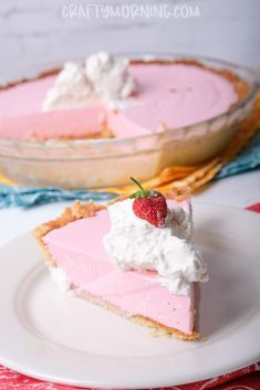 a slice of strawberry cream pie on a plate