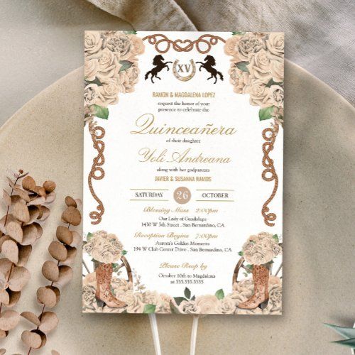 an ornate wedding card on top of a plate next to some nuts and other items