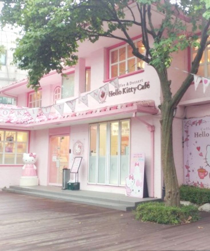 the hello kitty cafe is painted pink and white