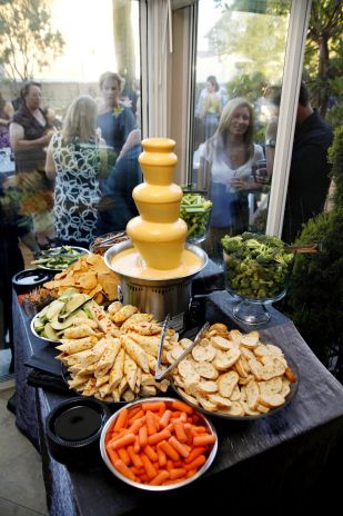 a buffet table filled with lots of food