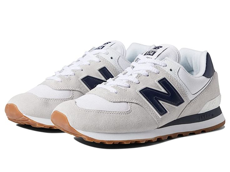 New Balance Classics ML574v2 - Men's Running Shoes : White/Navy : Add a vintage runner design to your wardrobe with the iconic silhouette of the New Balance Classics ML574v2 sneakers. Casual shoes with suede and mesh or textile uppers in a sporty silhouette. Foam-padded collar and tongue. Soft linings and a removable foam insole provide all-day comfort. Traditional lace-up closure. TPU heel insert for extra support. ENCAP® midsole for cushioning. Durable rubber outsole. Imported. Measurements: W Mens Popular Shoes, Classic Sneakers Mens, White Shoes For Men, Shoes Men Outfit, Guys Sneakers, Men’s New Balance Shoes, Men S New Balance, Boys Shoes Aesthetic, Shoe For Men