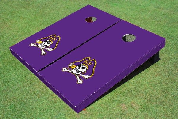 a purple cornhole game with a skull and crossbones on the side is shown