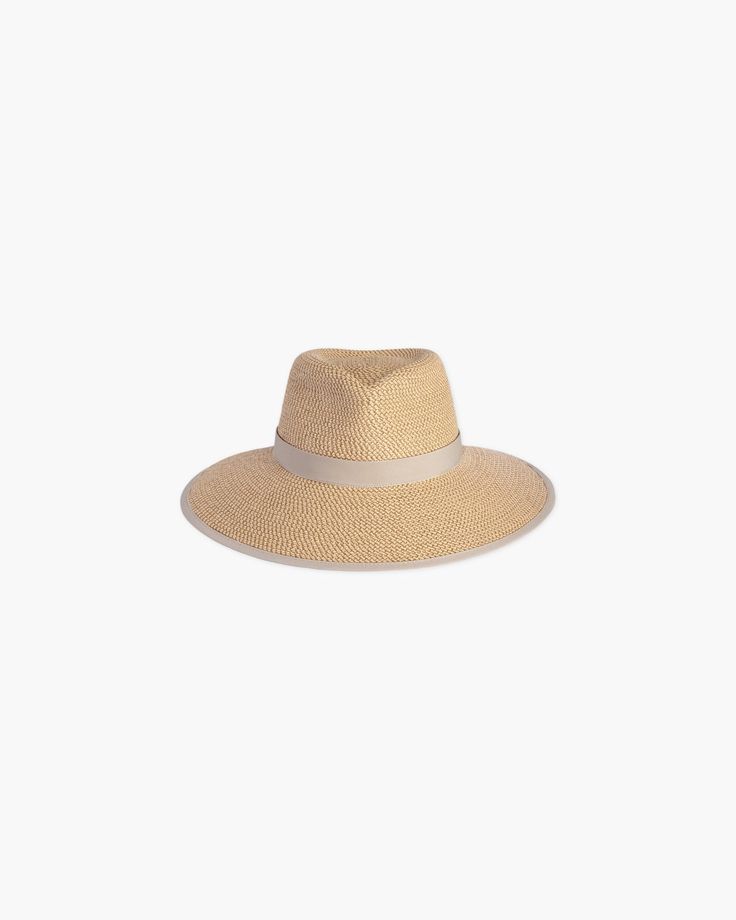 The Sun Crest visor is a stylish hybrid of the classic high-crowned fedora hat and a practical visor with a generous 4-inch brim. This fashionable Squishee® straw hat is trimmed with grosgrain ribbon for a chic, polished finish. You'll turn heads wherever you go this summer. Our revolutionary Squishee material is a synthetic straw fabric constructed from partially recycled plastics. This environmentally friendly material resembles genuine raffia straw, but it offers several practical advantages Straw Visor, Art Costume, Visor Hat, Women's Headwear, Visor Hats, Fedora Hat, Summer Look, Straw Hat, Grosgrain Ribbon