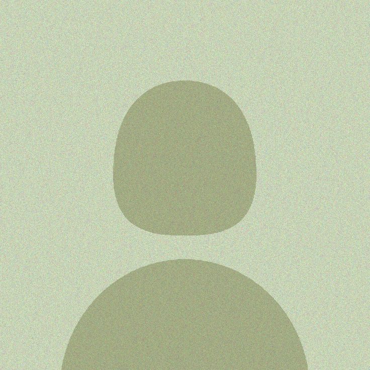 an image of a person's head with two circles above it on a light green background