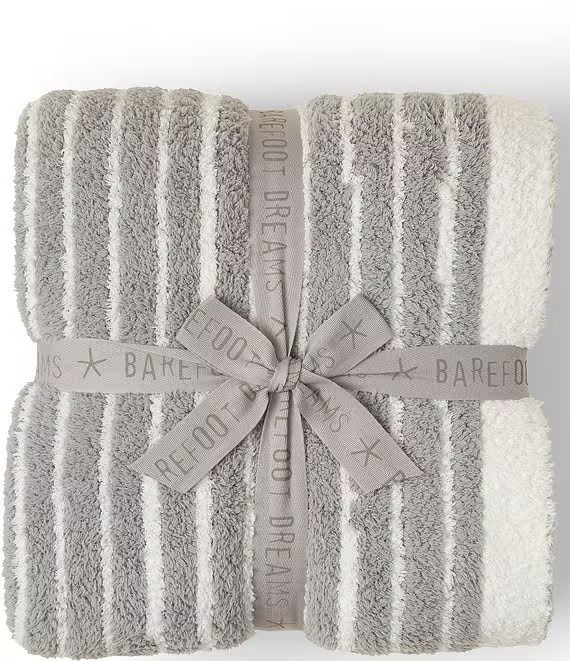 three towels wrapped in grey and white stripes, tied together with a ribbon on the end