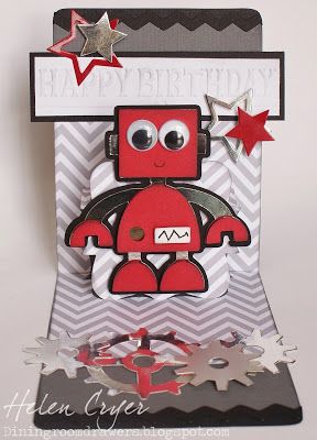 a birthday card with a red robot on it