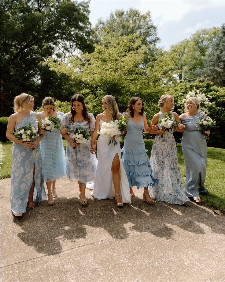 a group of women standing next to each other