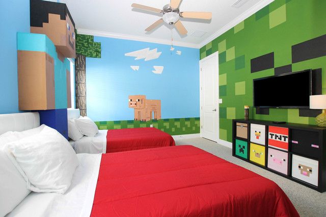 a bedroom with two beds and a flat screen tv on the wall in front of it