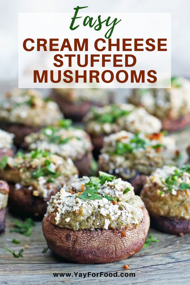 an image of stuffed mushrooms with cheese and parsley on the top text reads easy cream cheese stuffed mushrooms