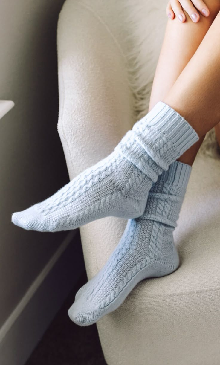 Indulge in opulent serenity with the exquisite Hailey Cashmere Socks, adorned with a distinctive cable and helix motif. Immerse yourself in the unparalleled softness of these socks, meticulously crafted from the most luxurious cashmere fibers. Inspired by the graceful undulations of the Mediterranean Sea, these velvety companions are an essential addition for your winter moments of pure luxury and comfort. Unparalleled Quality: Made from the finest cashmere for superior softness. Cozy, Effortles Cable Socks, Intermediate Knitting Patterns, Cable Knit Socks, Advanced Knitting, Luxury Socks, Socks Knitting, Dishcloth Knitting Patterns, Fair Isle Knitting Patterns, Cashmere Socks