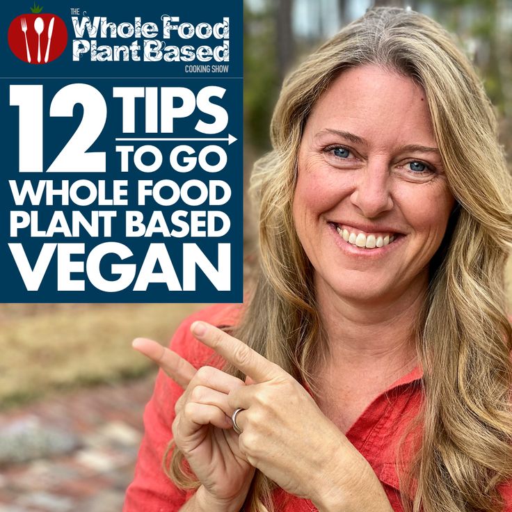 a woman holding up a sign that says 12 tips to go whole food plant based vegan