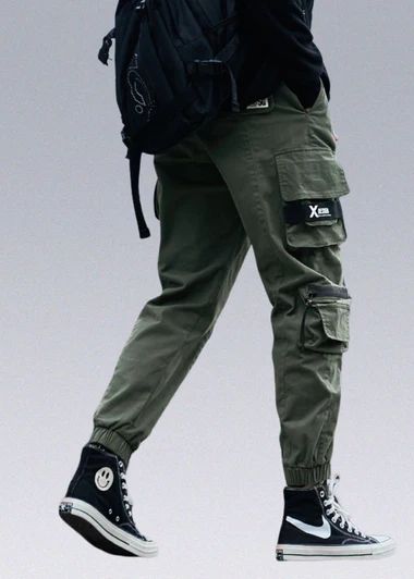 Khaki Bottoms With Cargo Pockets For Winter, Fitted Khaki Pants For Streetwear, Hip Hop Style Stretch Bottoms With Pockets, Hip Hop Stretch Bottoms With Pockets, Fitted Green Cargo Pants For Streetwear, Winter Cargo Style Full-length Pants, Winter Cargo Style Full Length Pants, Stretch Winter Cargo Pants, Stretch Winter Cargo Trousers