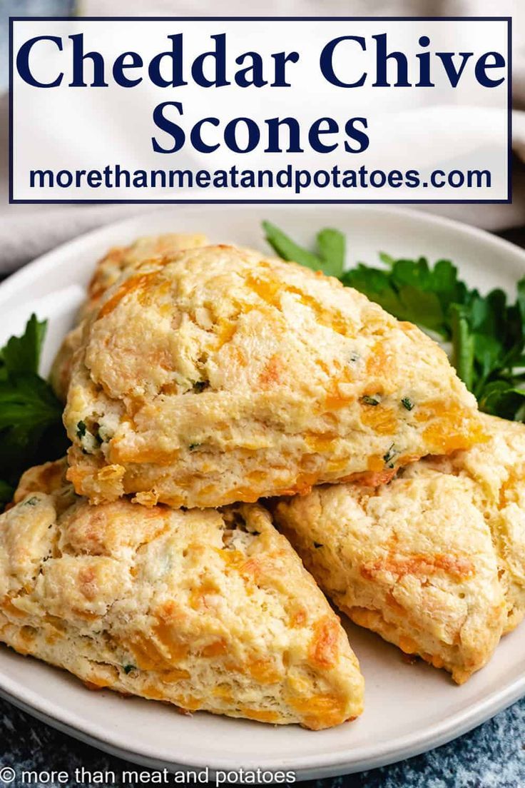 cheddar chive scones on a plate with parsley