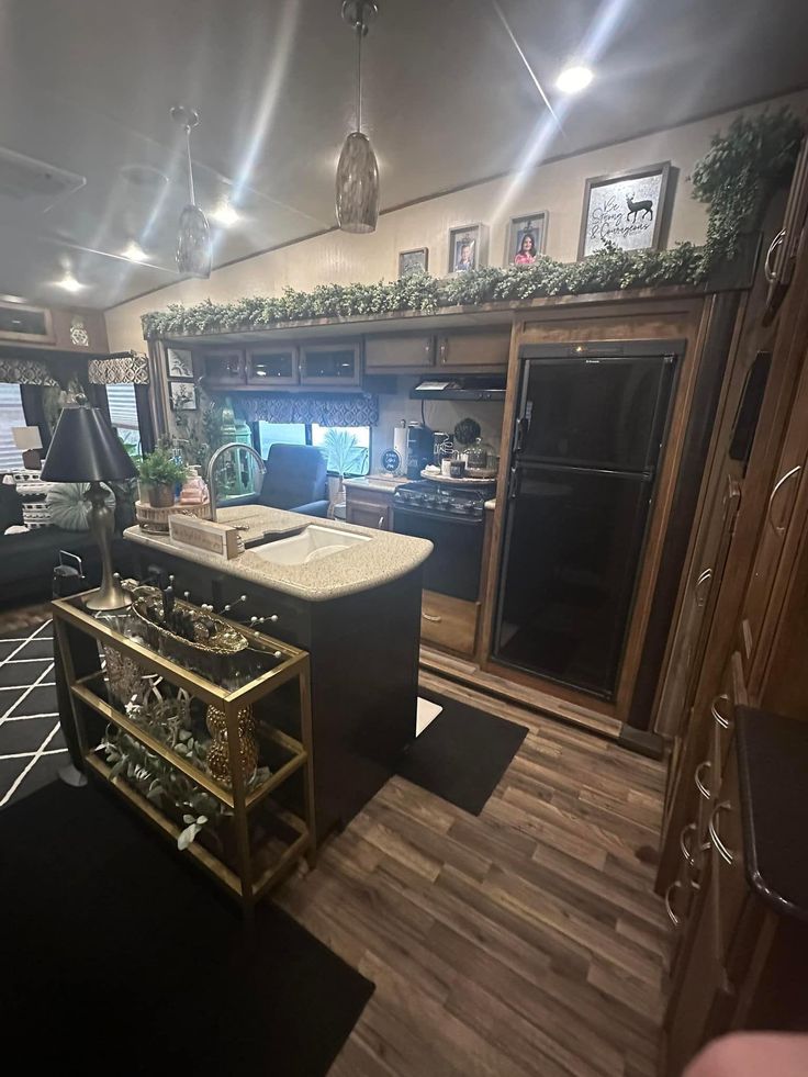 a kitchen and living room in an rv