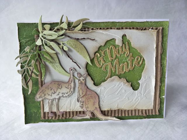 a card with an australian map and two kangaroos