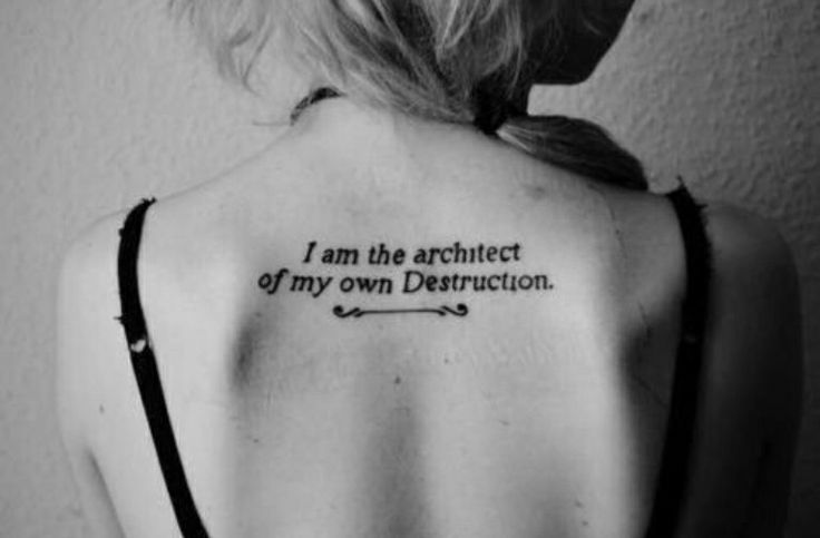 the back of a woman's neck with an inscription on it that says i am the