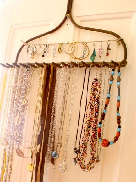 a rack with beads hanging from it's sides