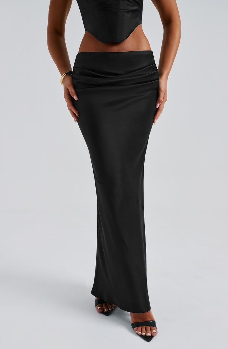 Oh she's luxury! Guaranteed to make you centre of attention, the Bernadette maxi crafted in our premium stretch satin, cut on the bias for a beautiful drape. This one-of-a-kind piece has a pleat detail to the front and diagonal seam at the knee. Pair with the Audra top for a dreamy, luxe look. 



Colour: Black.

Luxury stretch satin fabric.

Fully lined.

Cut on the bias for a beautiful drape.

Pleat detail to front.

Diagonal seam at knee.

Invisible zipper fastening. Maxi length.

 Size: XS, S, M, L, XL, XXL Stretch Satin Fabric, Split Long Dress, Loungewear Dresses, Maxi Dress Sale, Black Luxury, Maxi Dress Navy, Beautiful Drapes, Jumpsuit Shorts Rompers, Stretch Satin