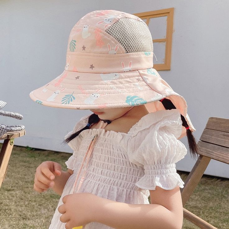 Keep your little ones safe and stylish in the sun with our super new, luxurious wide-brimmed Beach Summer Hat for Kids. Designed with both boys and girls in mind, this colorful hat is perfect for any summer adventure. Specifications: Wide-brimmed sunshade hat with an adjustable drawstring behind the head to provide a secure and comfortable fit. Soft and foldable design for easy packing and carrying. Breathable lining inside the hat to keep your child cool and comfortable. High-quality cotton fab Cute Summer Sun Hat For Playtime, Cute Summer Sun Hat For Play, Cute Summer Hats For Playtime, Summer Sun Hat With Uv Protection For Playtime, Cute Bucket Hat For Beach Season, Summer Hats With Uv Protection For Playtime, Playful Sun Hat With Upf 50+ And Adjustable Fit, Playful Bucket Hat With Uv Protection, Playful Sun Hat With Uv Protection And Adjustable Fit