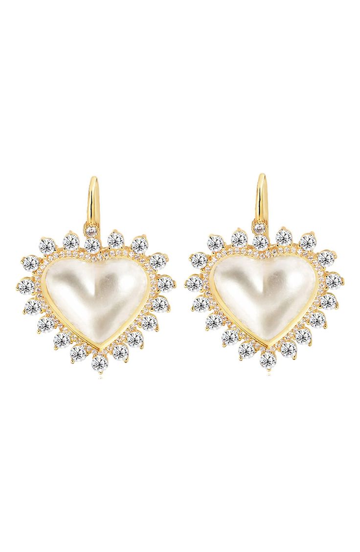 Polished 14-karat gold-plated sterling silver earrings suspend romantic mother-of-pearl heart drops framed in sparkling cubic zirconia halos. 3/4" drop; 5/8" width French wire Sterling silver/14k-gold plate/mother-of-pearl/cubic zirconia Made in Turkey Elegant Gold Plated Earrings For Valentine's Day, Elegant Dangle Heart Earrings For Anniversary, Elegant Heart Earrings With Cubic Zirconia For Valentine's Day, Elegant Cubic Zirconia Heart Earrings For Valentine's Day, Elegant Gold Plated Heart Pendant Earrings, Elegant Silver Heart Earrings, Gold Plated, Elegant Gold Plated Heart Earrings As Gift, Heart Shaped Pearl Earrings As Gift, Elegant Heart-shaped Pearl Earrings