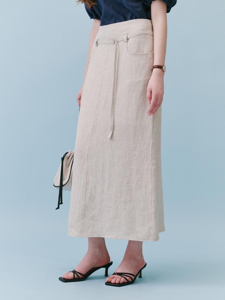 Cut from lightweight linen fabric, this low rise skirt features classic H-line in maxi length. It is accentuated with adjustable strap belt at waist.  - Breathable linen skirt- Straight silhouette in long length- Back zip fastenings- Deep slit details at back hem- Lined for added flexibility Linen Long Skirt, Low Rise Skirt, Skirt Straight, Linen Skirt, Long Length, Long Skirt, Linen Fabric, Low Rise, Adjustable Straps