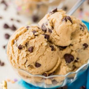 two scoops of cookie dough in a glass bowl with the words safe edible cookie dough