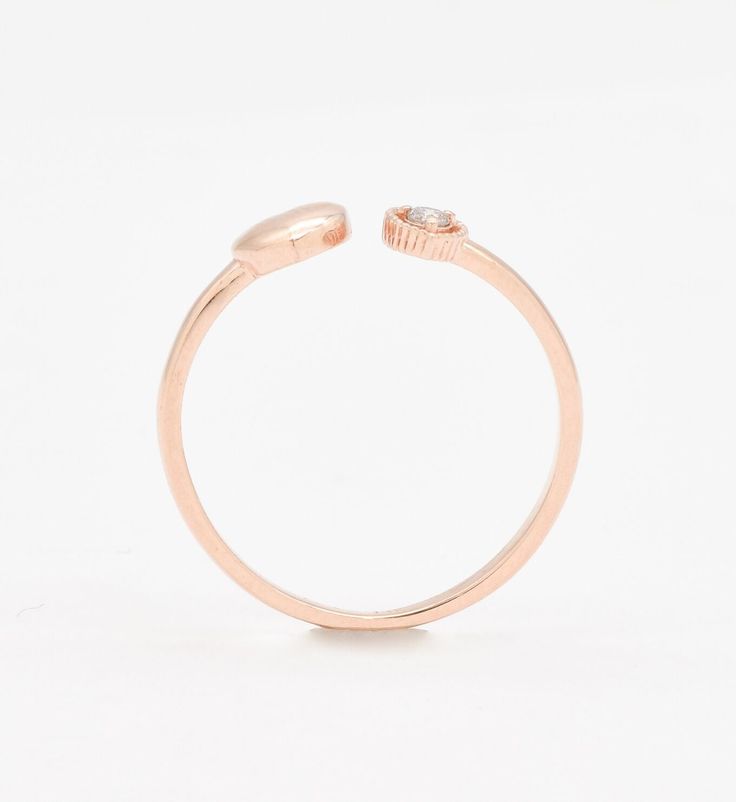 Certified Real Diamond Open Heart Ring set with Diamond, size 2 millimeters diameter, 0.03 Carats.Solid 14k Rose Gold ☞ made to last.Click here for ☞ Solid Gold CollectionDiamond Details:• CERTIFIED Natural Diamond• Weight: 0.03 Carats• Dimensions: 2mmSolid Gold Details:• 1.2 grams of 14k Solid Rose Gold• Dimensions: Band width ≈ 1.5mm, thickness ≈ 1mm• Lasts a lifetime - Perfect for everyday use (won’t tarnish)! *Final weight & dimensions depending on the chosen ring sizeSKU RT-1543 Rose Gold Stackable Heart Ring For Valentine's Day, Stackable Rose Gold Heart Ring For Valentine's Day, Rose Gold Initial Ring With Round Band For Anniversary, Fine Jewelry Rose Gold Midi Ring With Open Band, Anniversary Rose Gold Stackable Heart Ring, Anniversary Rose Gold Initial Ring With Round Band, Rose Gold Initial Ring For Anniversary, Rose Gold Midi Rings With Open Band Style, Stackable Rose Gold Heart Ring In 14k Gold