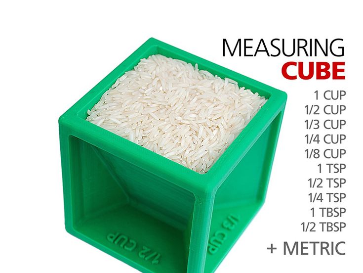 the measuring cube is filled with rice and ready to be used as a storage container