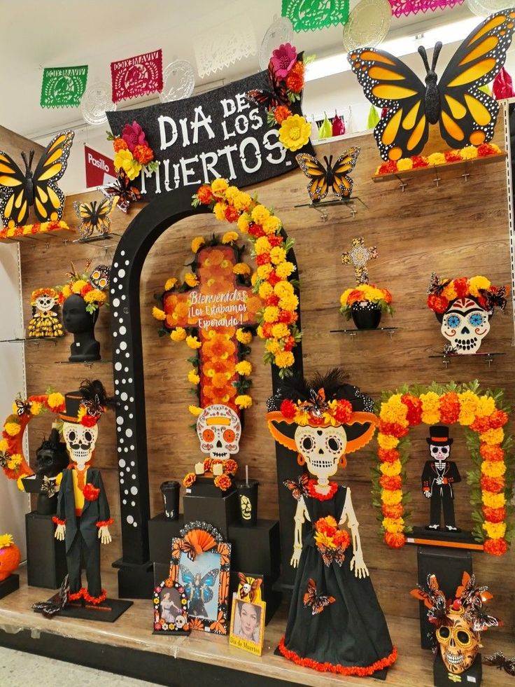 a display in a store filled with lots of halloween decorations and decorations on the wall