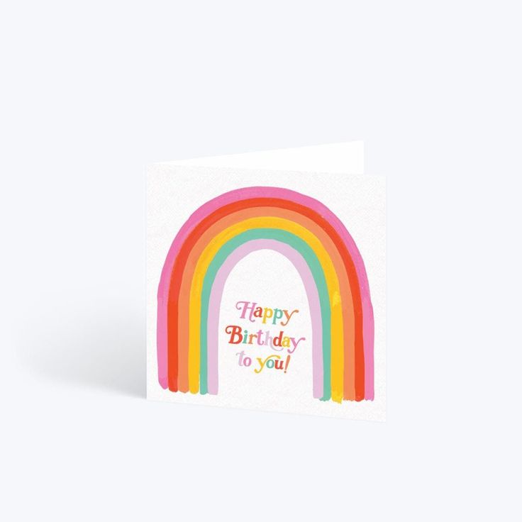 a card with a rainbow and the words happy birthday to you