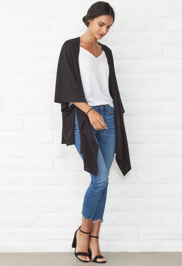 This versatile piece goes from cardigan to wrap to scarf! Ideal for travel and layering in soft, sustainable modal. Shop Now! Black Oversized Versatile Cardigan, Oversized Black Versatile Cardigan, Black Oversized Open Front Cardigan, Oversized Black Open Front Cardigan, Shawl For Layering, Versatile Black Open Front Cardigan, Black Wrap Cardigan For Layering, Black Wrap Cardigan For Fall, Black One Size Kimono