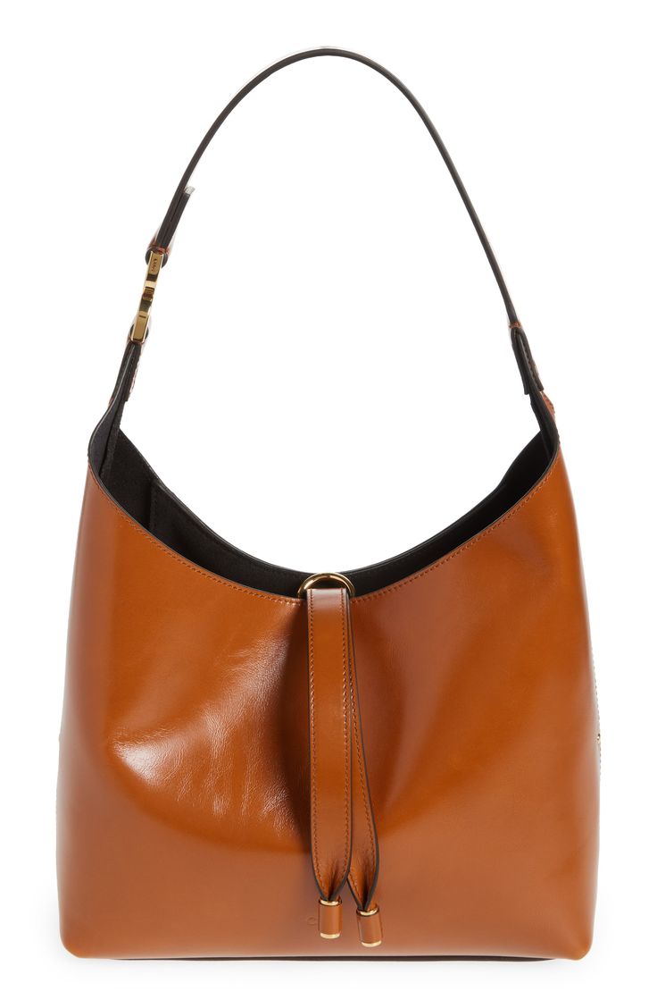 This slouchy calfskin-leather hobo bag blends a modern aesthetic with a '70s folk spirit, and of course has the Marcie line's signature slip-tassel closure. Bridge-tassel closure Shoulder strap Interior zip wall pocket Protective metal feet Leather Made in Italy Designer Handbags This brand has B Corp certification, representing business practices with emphasis on social and environmental performance, accountability and transparency This brand meets Nordstrom Responsible Brands criteria: brand a Chic Brown Calf Leather Bucket Bag, Chic Calf Leather Hobo Bag For Shopping, Chic Calf Leather Hobo Bag With Removable Pouch, Calf Leather Hobo Bag With Leather Handles, Chic Calf Leather Crossbody Hobo Bag, Chic Cognac Hobo Bag For Shopping, Chic Leather Hobo Bucket Bag, Calf Leather Hobo Bag With Tote Shape, Calf Leather Hobo Bag With Leather Lining