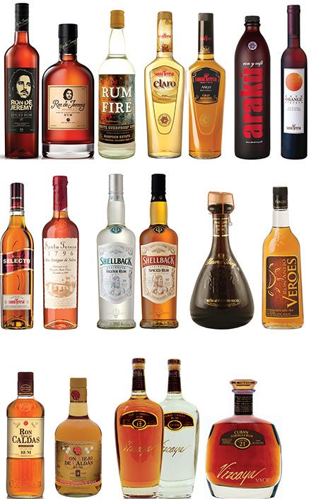 many different types of alcohol bottles lined up