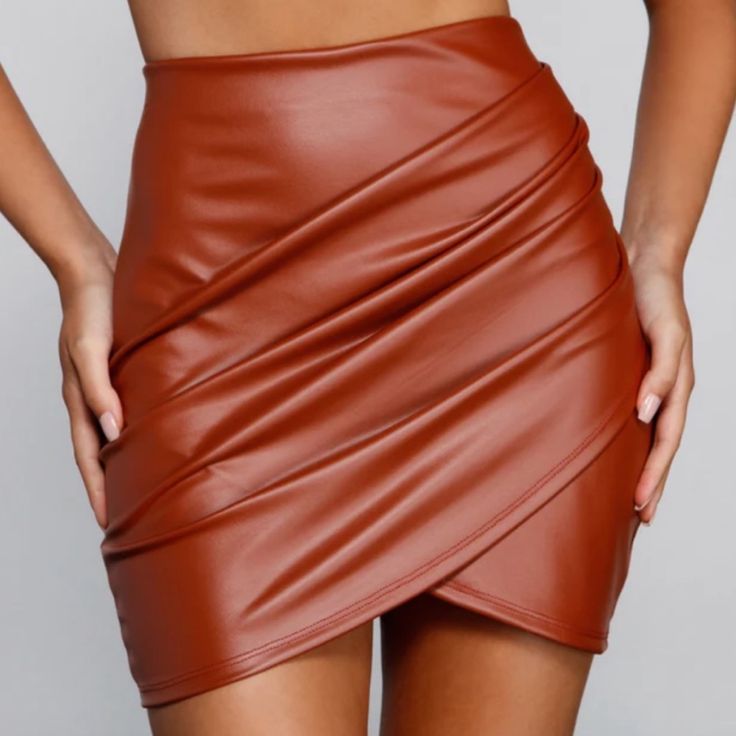 Windsor Faux Leather Skirt Size: Medium Color: Rust Nwot Fitted Brown Faux Leather Mini Skirt, Trendy Brown Skirt For Date Night, Brown Mini Skirt For Date Night, Brown Faux Leather Skirt For Party, Brown Faux Leather Mini Skirt For Party, Party Faux Leather Brown Mini Skirt, Chic Brown Faux Leather Skirt, Trendy Brown Mini Skirt For Night Out, Trendy Brown Faux Leather Mini Skirt