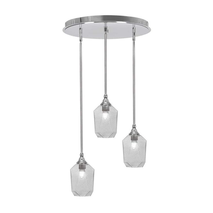 three lights hanging from a ceiling fixture with glass shades on the top and bottom part