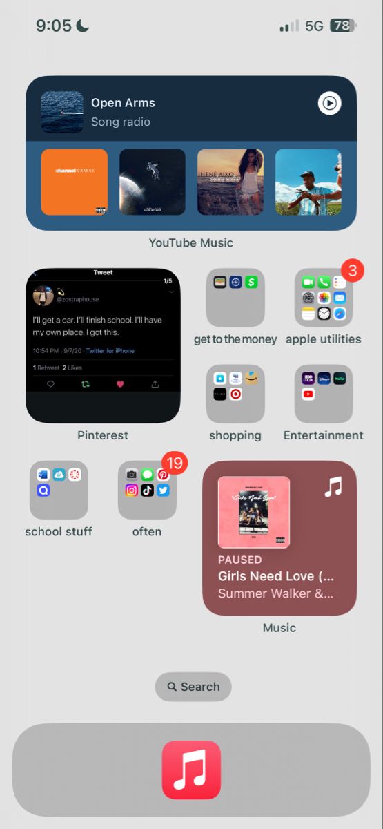 an iphone screen with various icons and text on the bottom right corner, including music